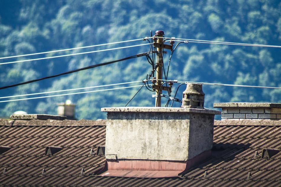 photo of power lines on the roof of the house