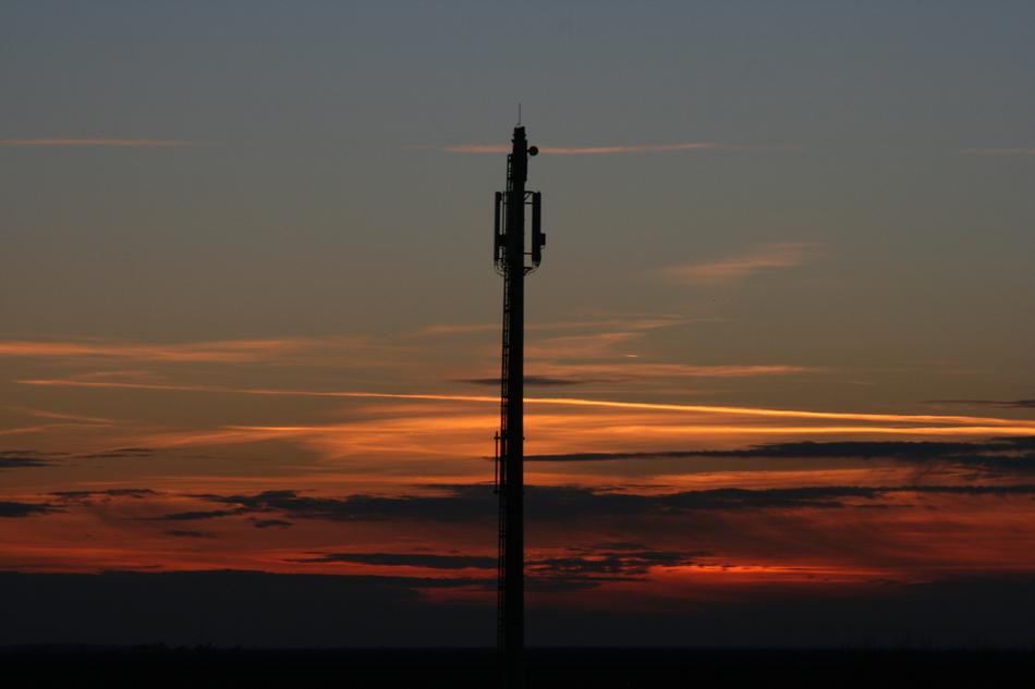 Close-up of the pole, at colorful and beautiful sunset with clouds