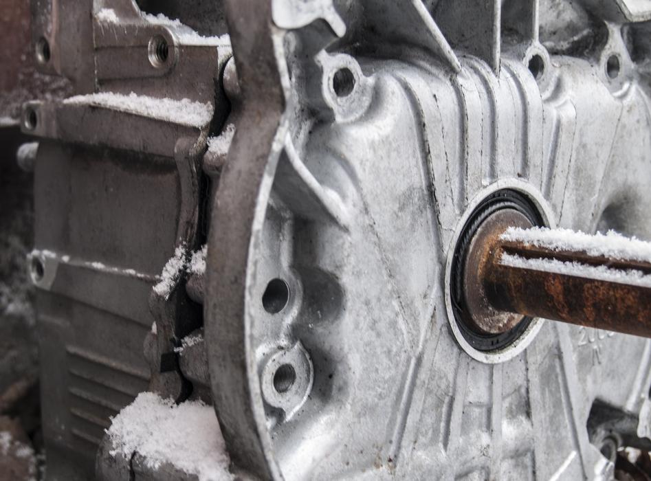 Close-up of the grey machine in white snow