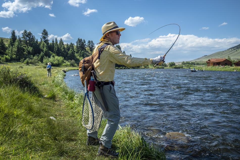 fisherman on the river on a sunny day