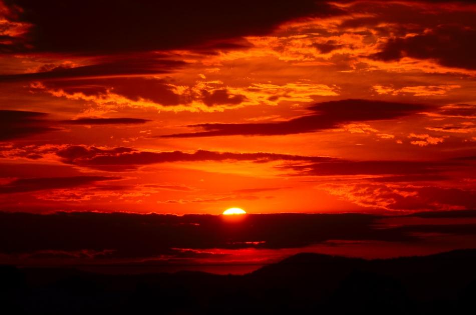 colorful red sunset over the valley