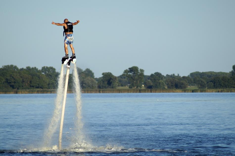athlete on flyboard at sea