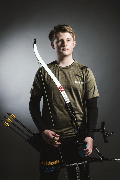 photo of an archer on a dark background