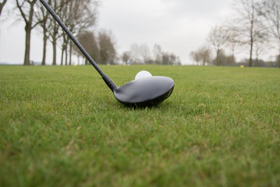 practicing golf
