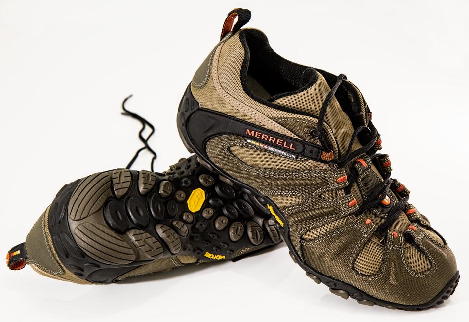 Colorful hiking shoes on white background