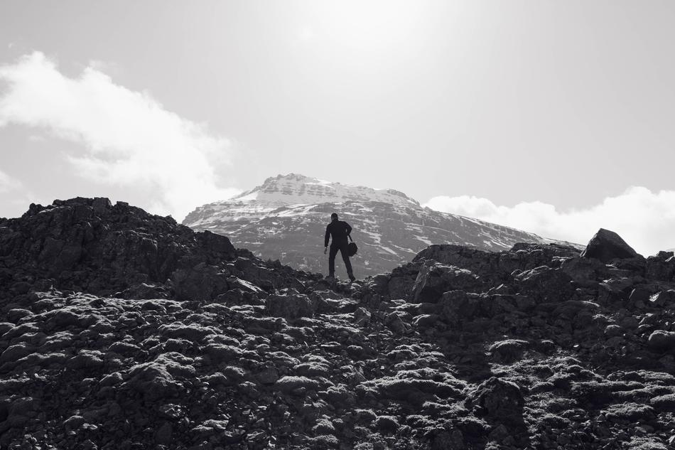monochrome photo of a climber on the mountain
