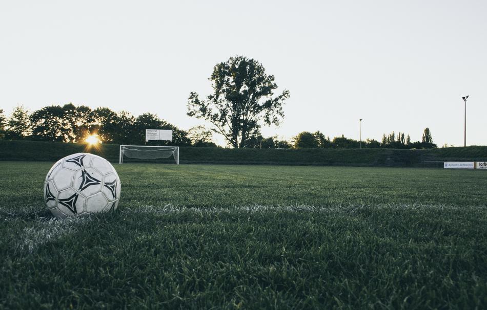 soccer ball on the evening field