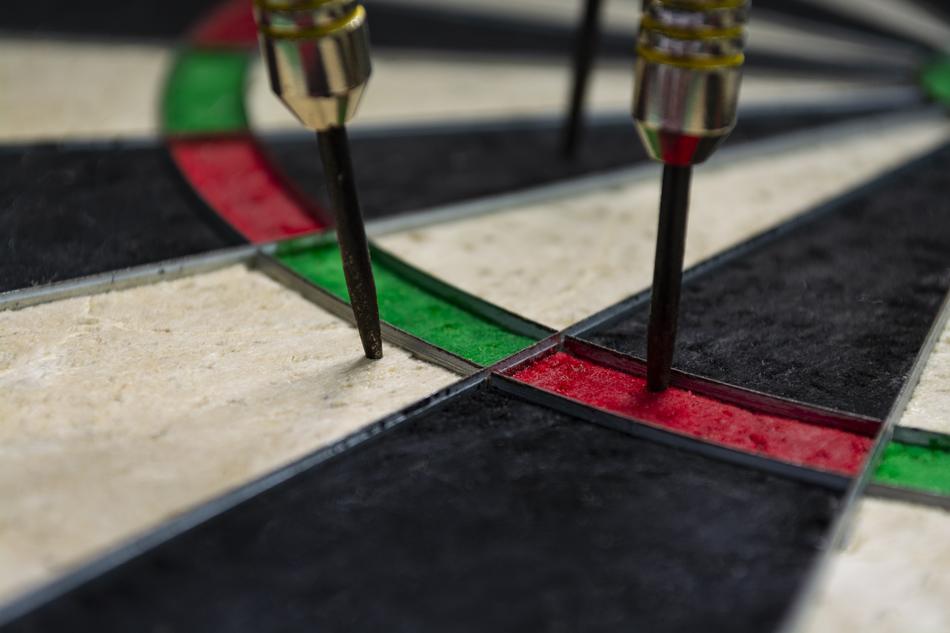 macro photo of a dart in the target