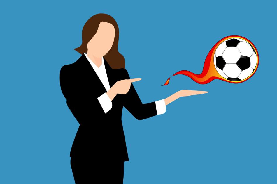 businesswoman and football ball