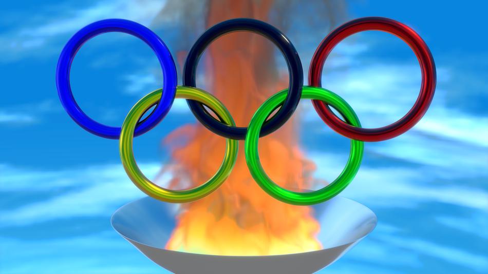 computer generated image of olympic rings on fire background