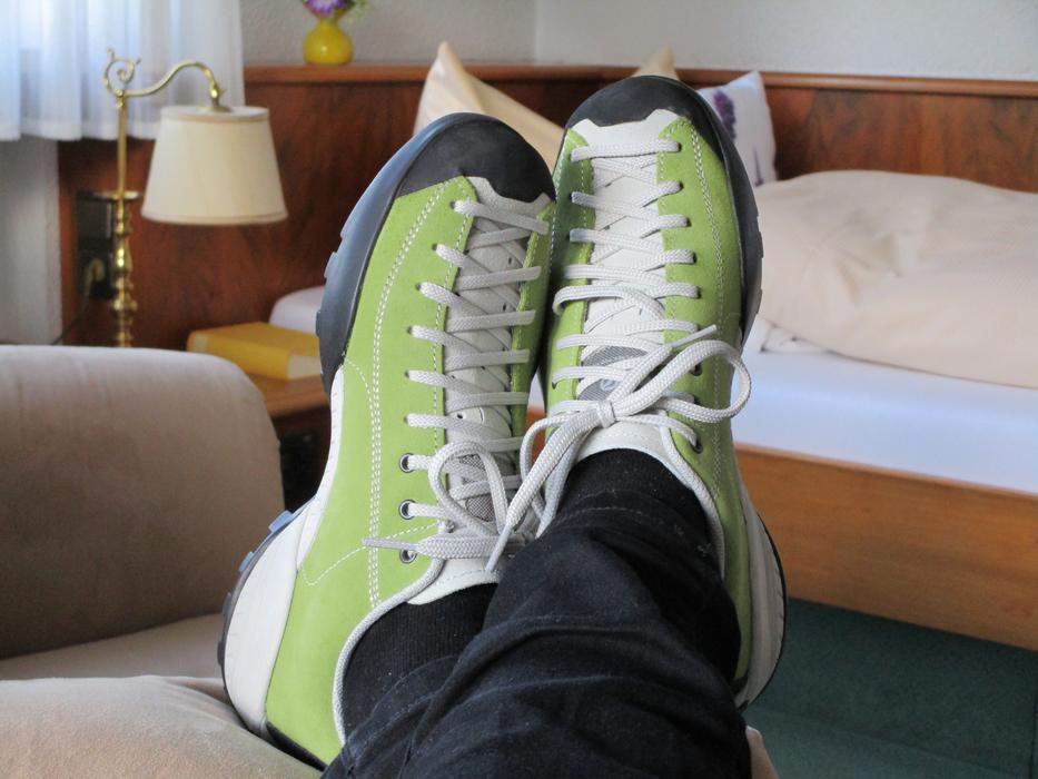 feet in Jogging Shoes on sofa