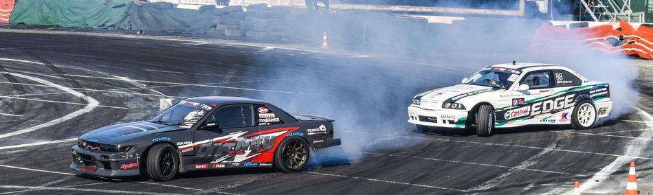 Colorful and beautiful cars, drifting on the road, on the competition