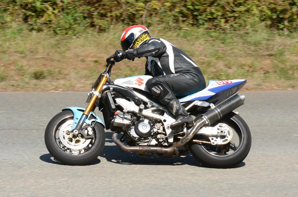 motorcyclist is racing along the track