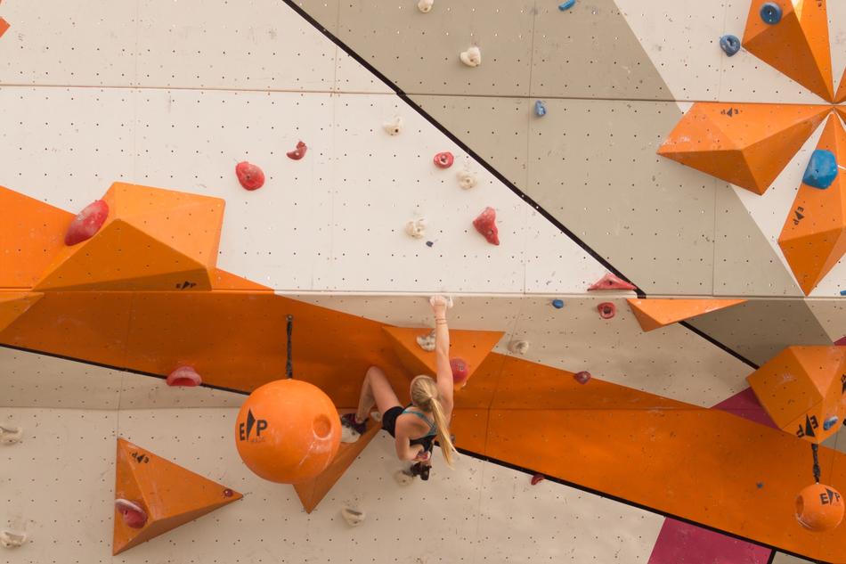 climbing young woman