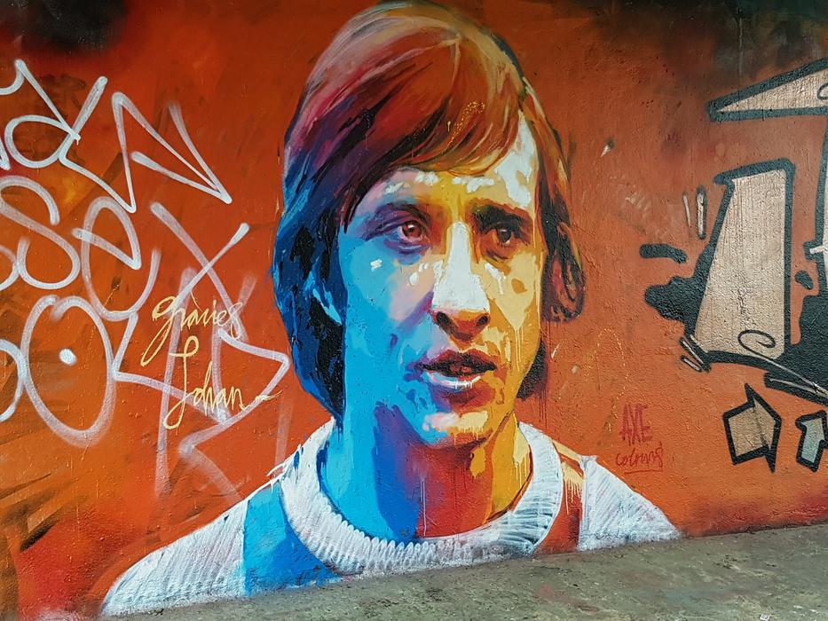 Colorful and beautiful graffiti of the portrait of Johan Cruyff, on the wall