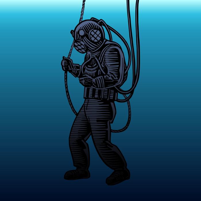 diver in a suit at the depths of the sea