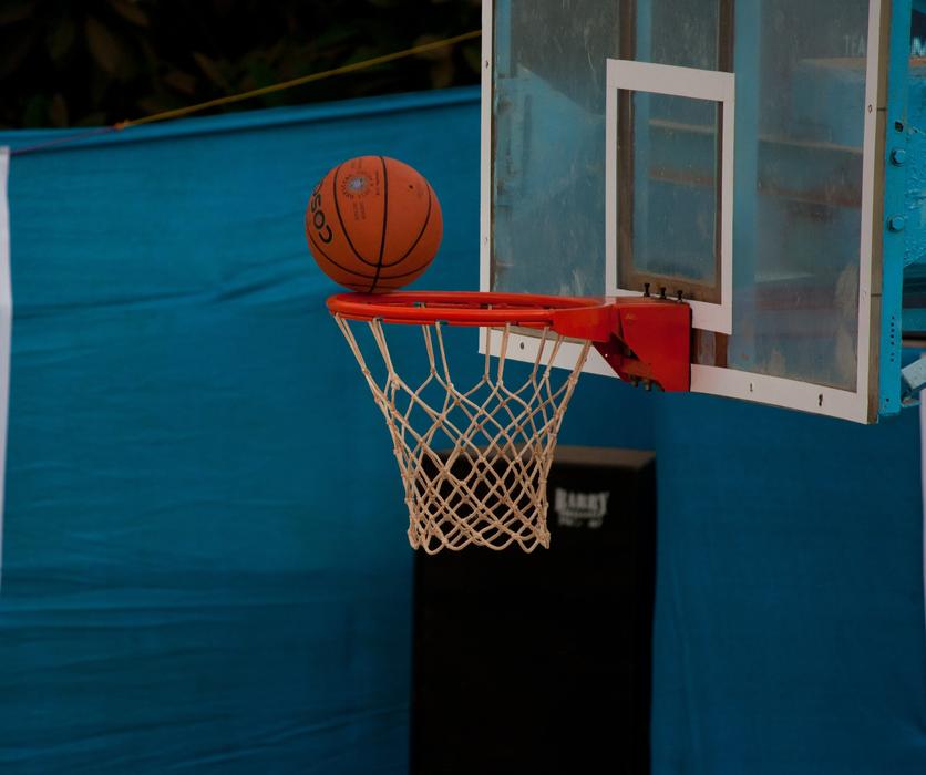 the basketball is on the ring