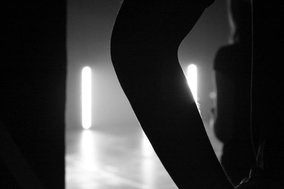 leg of dancer on stage, black and white