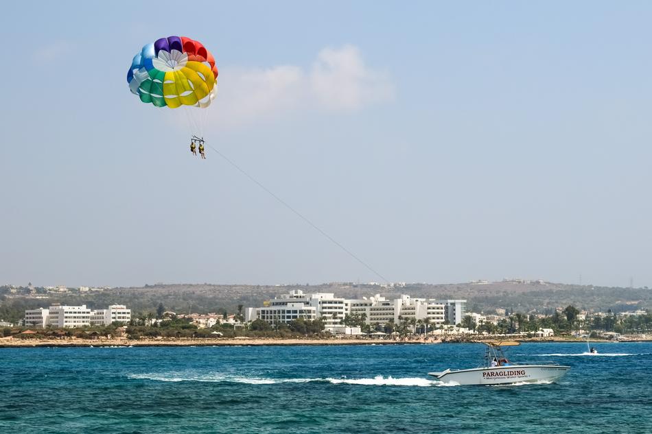 parachute flying over the beach in Ayia Napa, Cyprus