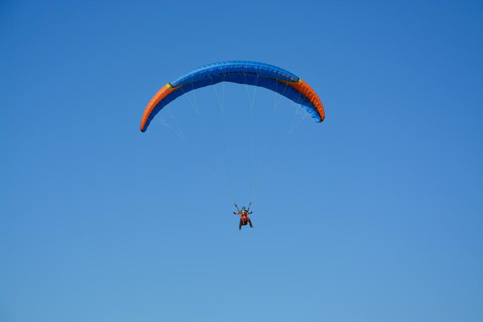 red Paragliding Tandem blue sky