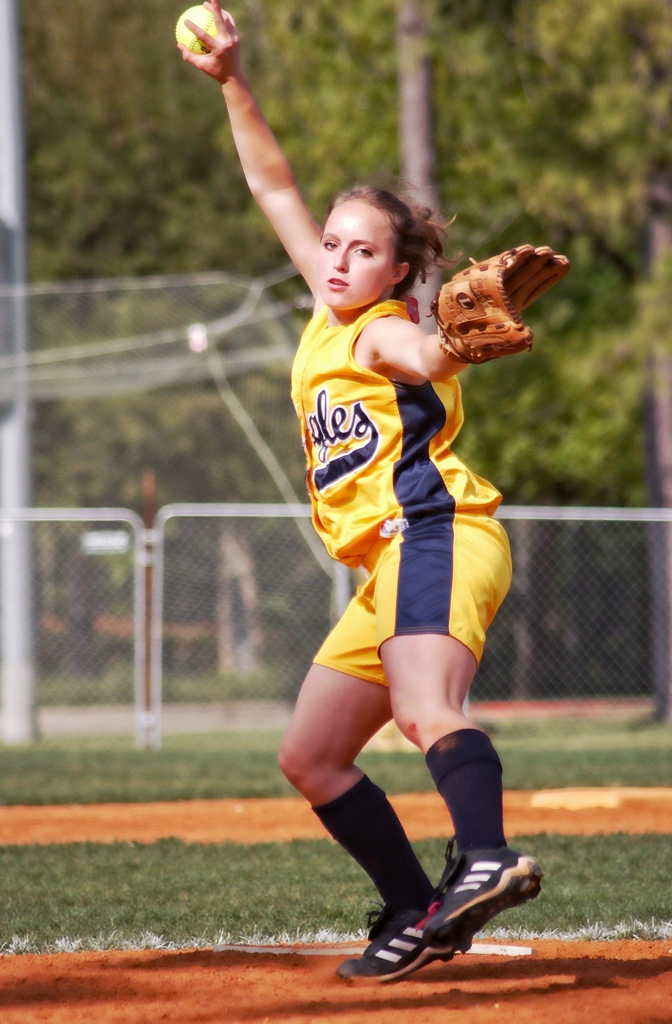 Softball Pitcher, Female player throwing ball free image download