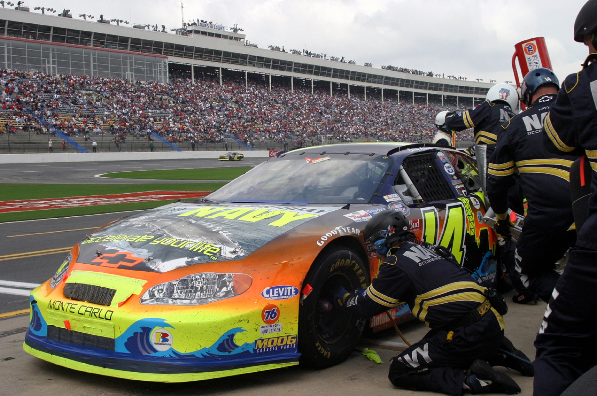 Changing tires during a car race free image download