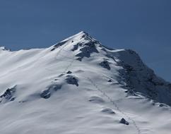 high mountains for skiing on a sunny day