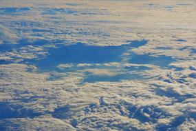 Beautiful, blue, gradient sky with the colorful clouds