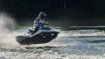 a man on a jet ski during a race