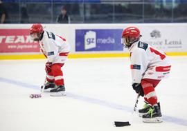 ice hockey players in blurred background