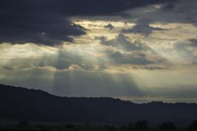 sunrise in the clouds over the natural landscape