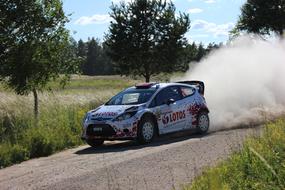 Kobert Kubica, in the colorful and beautiful Ford Lotus, in movement on the road, on the Rally Poland 2014