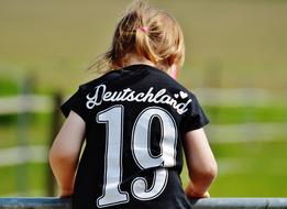 child Girl with number 19 on uniform