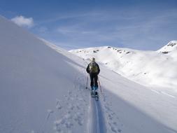 skier is skiing on the slope on the mountain