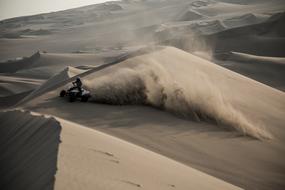 ride a quad bike on the sand dunes