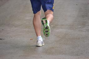 runner feet in sports shoes