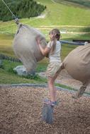 Child Girl playing sack game