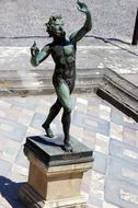 antique bronze statue in pompeii