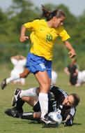 fall in football in blurred background