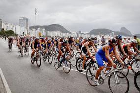 Cycling Competition on a city street on a cloudy day