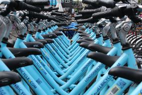 many blue bicycles in london