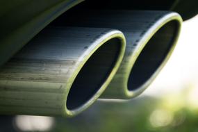 double exhaust of a sports car close up