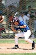 Baseball Little League Batter on the game in a blurred background