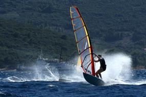 Person, doing windsurfing in Peljesac, Czech Republic