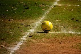 yellow ball on the soccer field