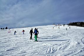 People, on the beautiful, snowy mountain in Feldberg, Germany