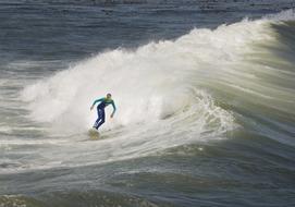 surfer caught the ocean wave