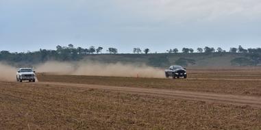 Pickup Trucks on Drag Race trace in Countryside
