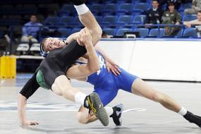 wrestlers in the ring in a college