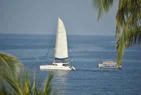 sailboat off the coast in Hawaii